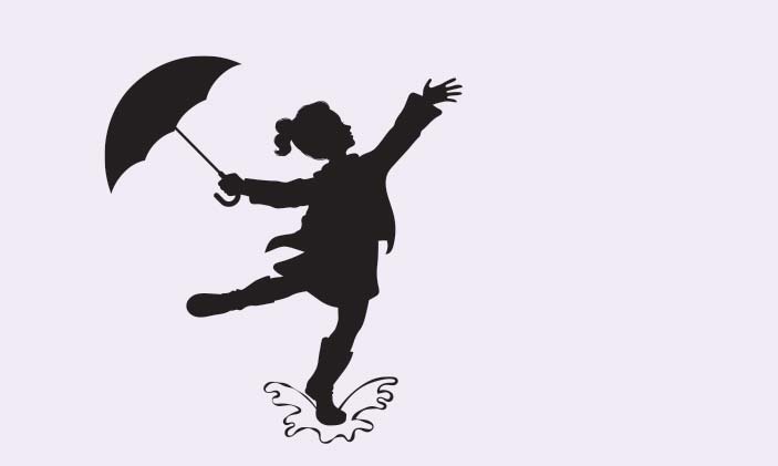 צל של ילדה קופצת עם מטריה